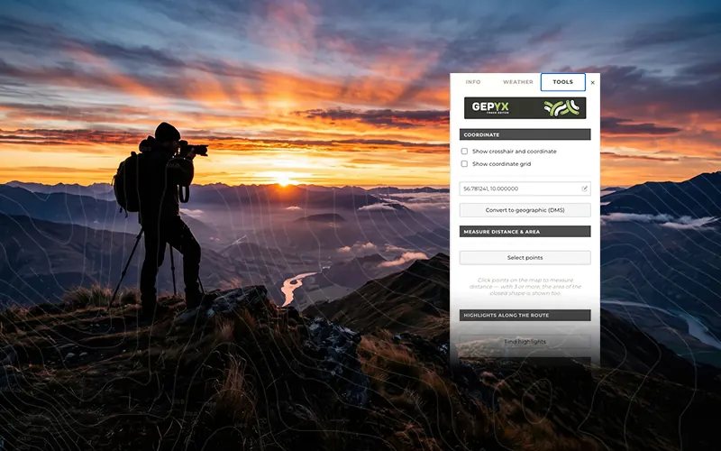 Mountaineer on a ridge at sunrise